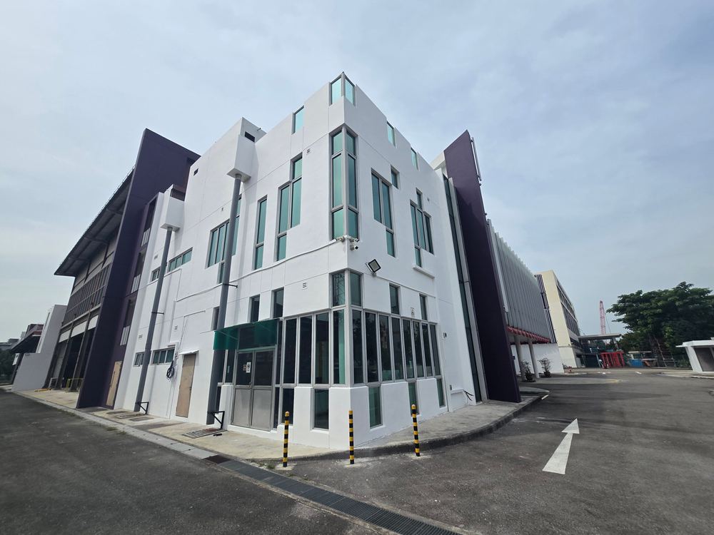 The same Singapore commercial building facade finished in clean white with plum feature panels, 21 January 2026